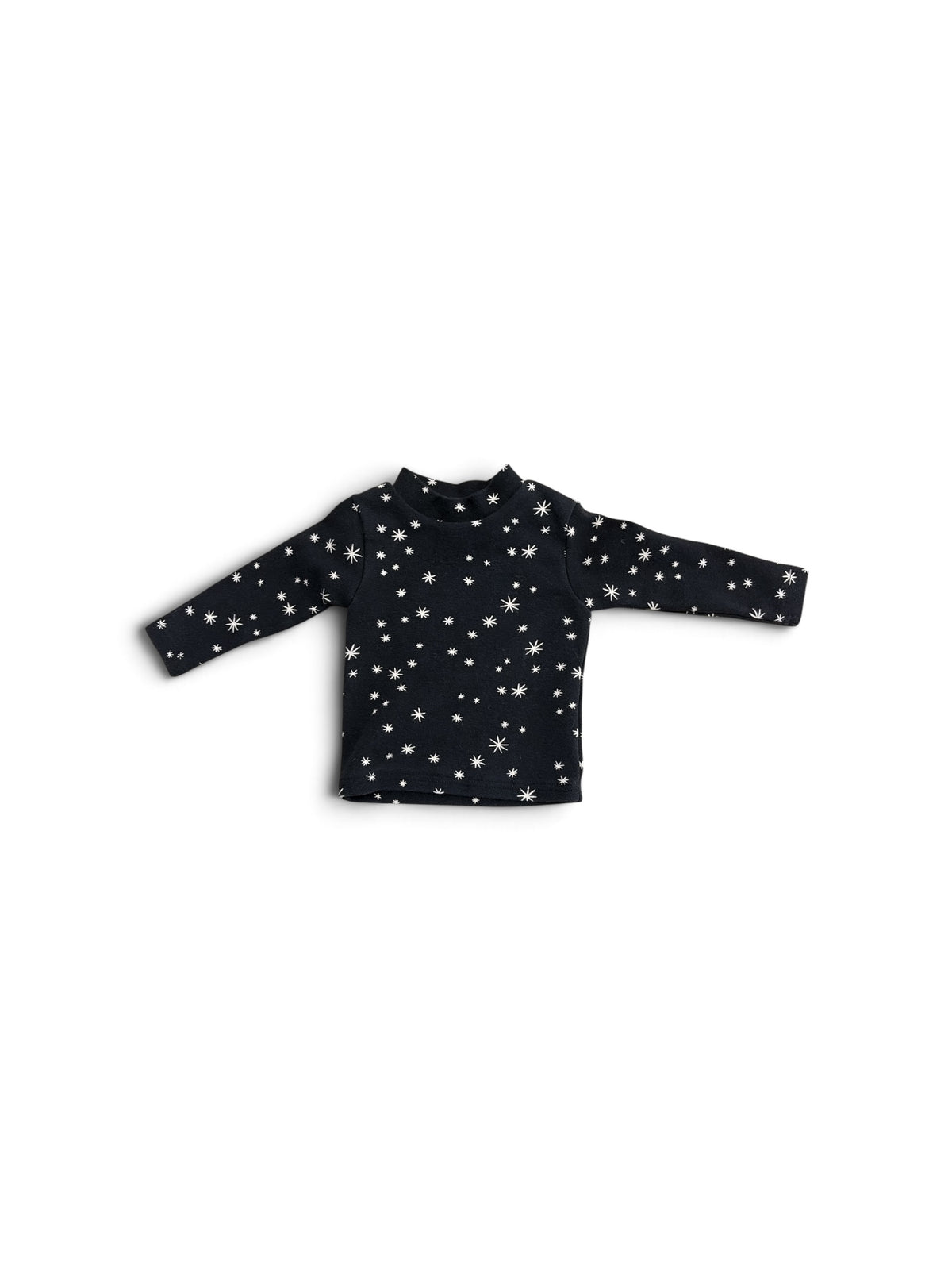 Toddler black mock turtleneck long-sleeve shirt featuring a white star print pattern.