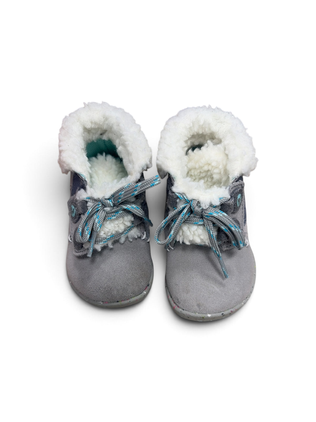 Merrell gray suede winter booties with white faux fur lining and blue-accented laces, top-down view.