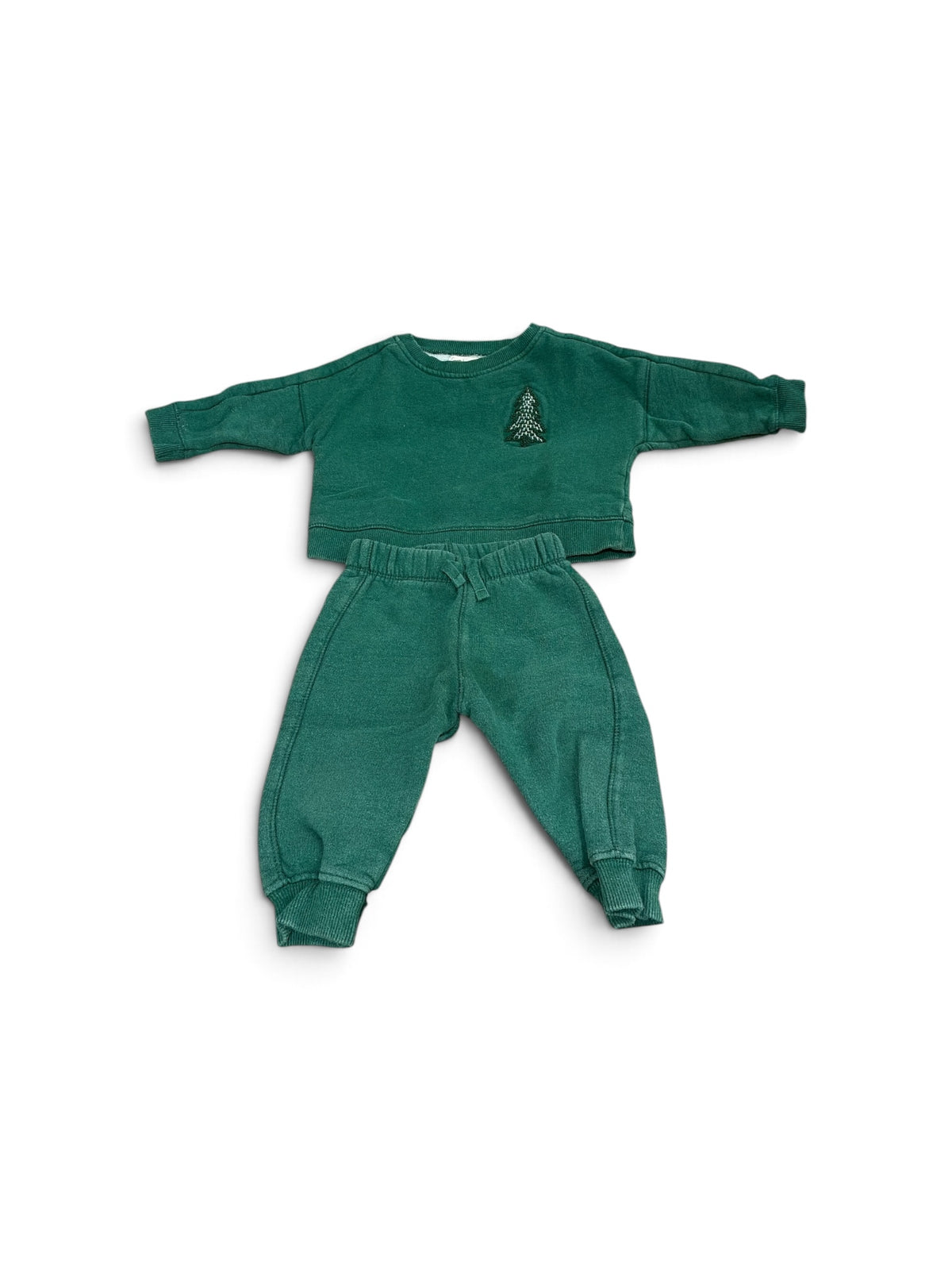 Monica + Andy baby green cotton sweatsuit featuring a small embroidered Christmas tree on the chest.