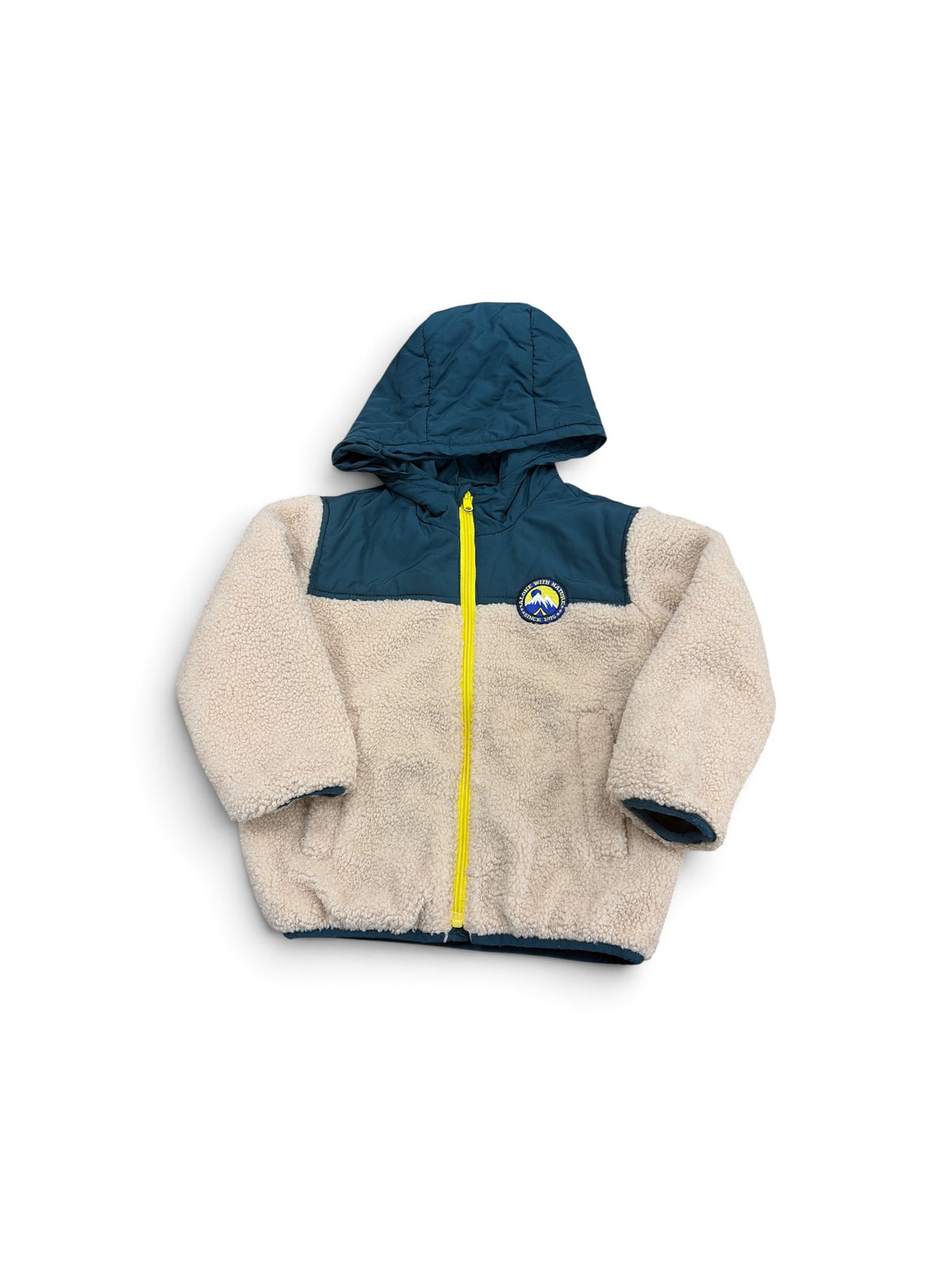 Zara kids beige fleece jacket with blue hood, yellow zipper, and mountain patch detail.